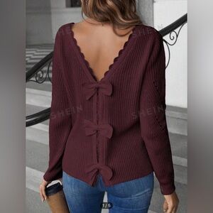 Brand new maroon sweater with bows